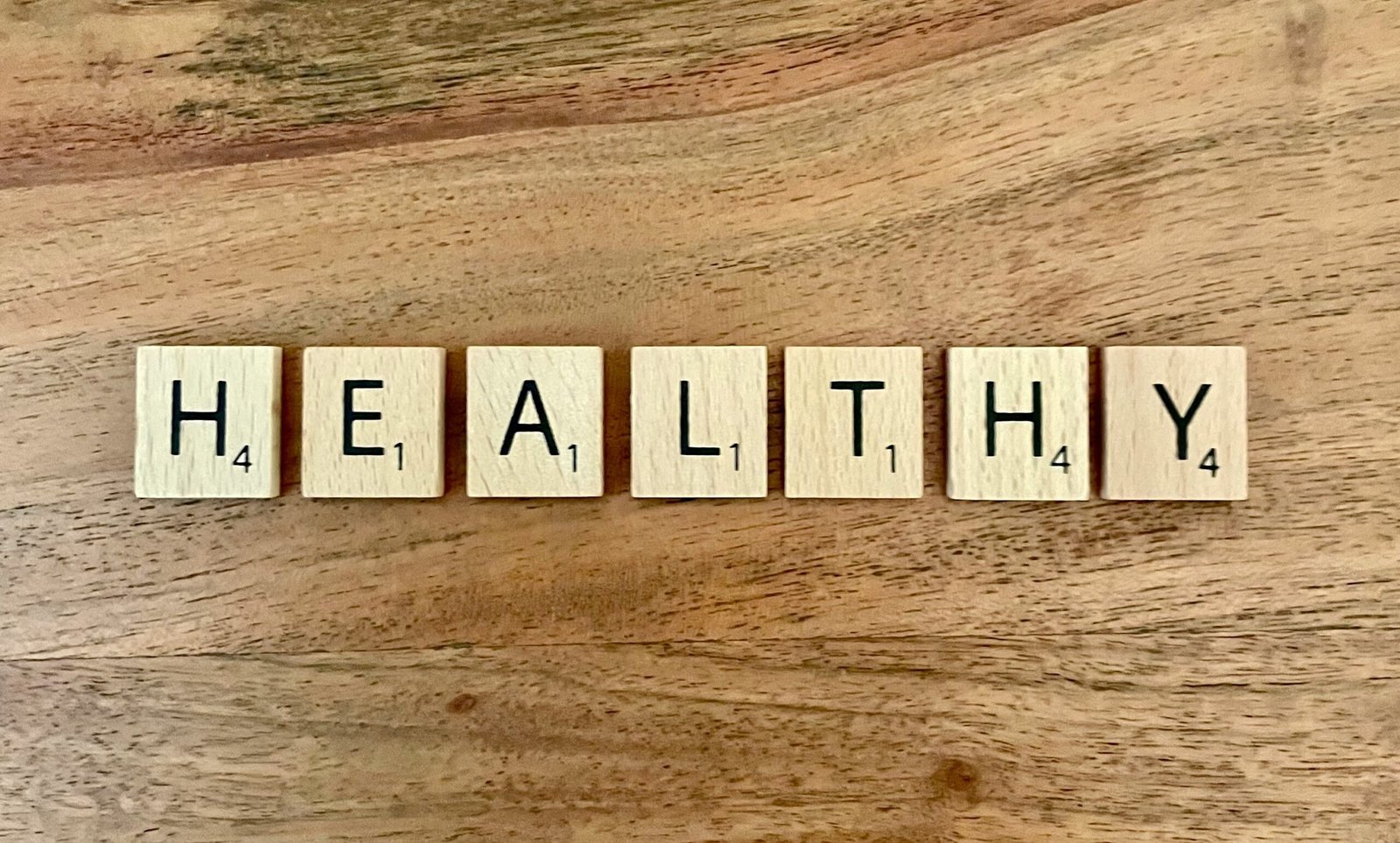 Doctor consulting a diverse patient family under Wellsense Health Plan in Massachusetts