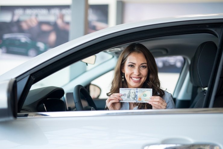 Customer trading in a financed vehicle at a dealership in 2025