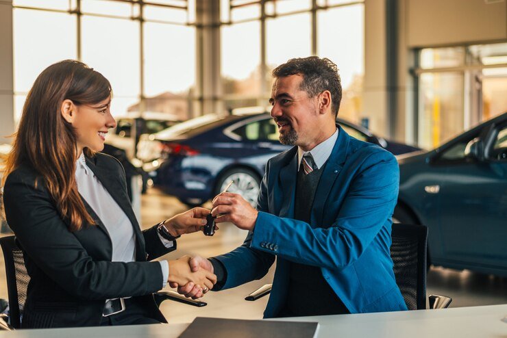 Auto Finance Center office helping a customer secure a car loan in Matthews NC