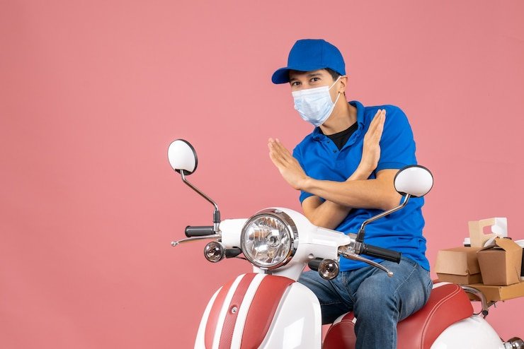 Motorcycle courier delivering packages with insured protection in 2025
