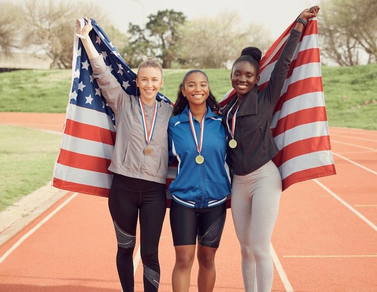 Diverse group of young athletes connecting through sports