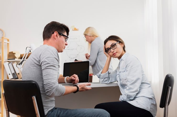 Mental health technician supporting a patient in a clinic